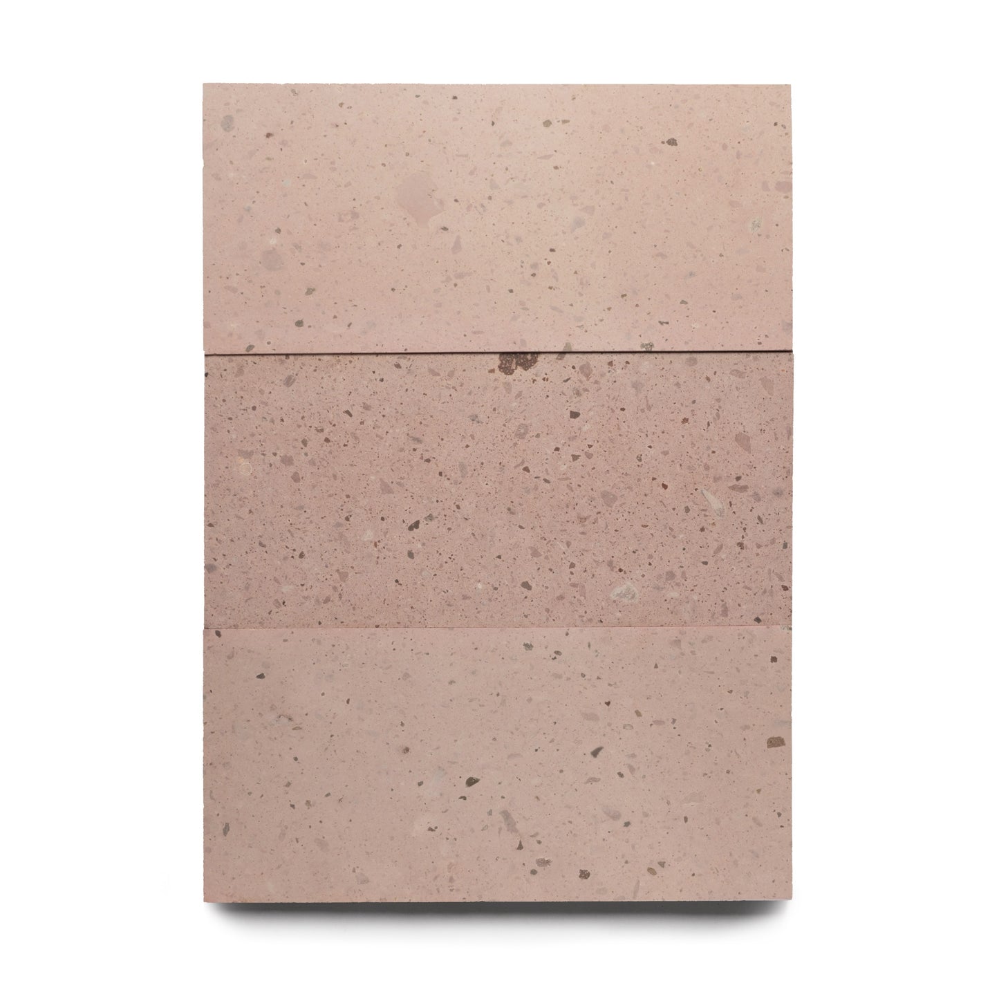 The Yuma 12x24 by Zia Tile is a rectangular slab with three horizontal sections of speckled, light pinkish Mexican Cantera stone tile, each showing unique tone and texture variations, set against a white background.