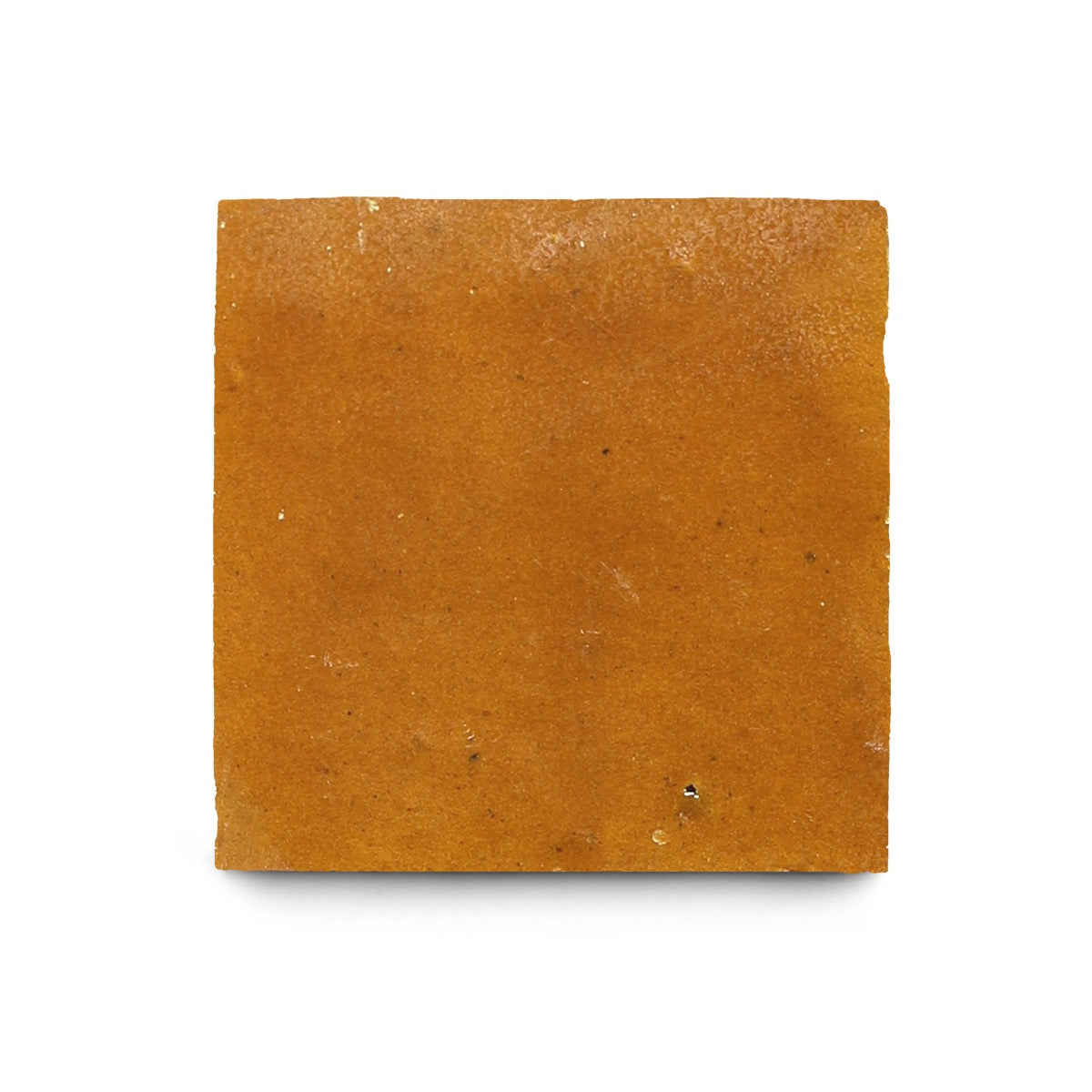 The Amber 4x4 tile features a smooth, matte orange-brown finish that showcases the artisanal beauty of traditional Moroccan craftsmanship against a plain white background.