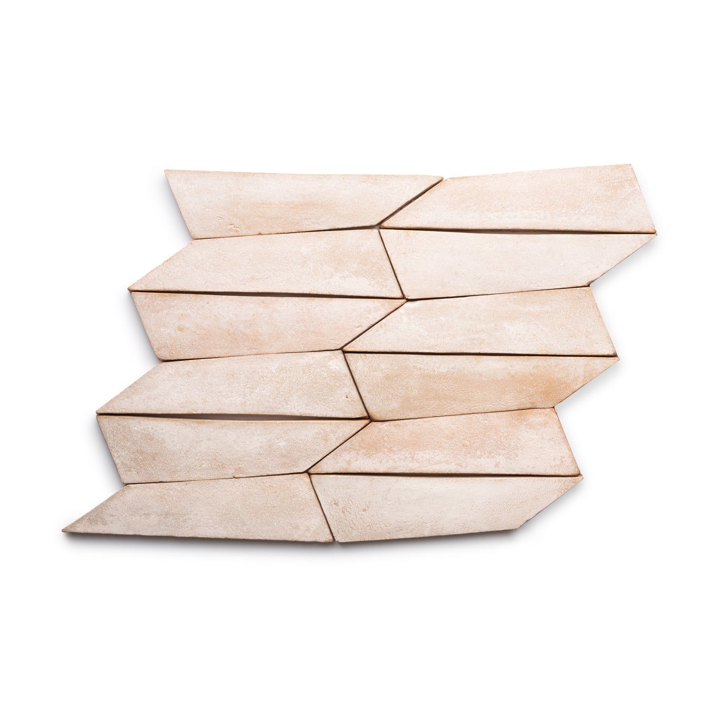 The Tornillo + Blanco ceramic tiles by Zia Tile feature a light beige color and irregular shape, arranged in a staggered geometric pattern on a white background.