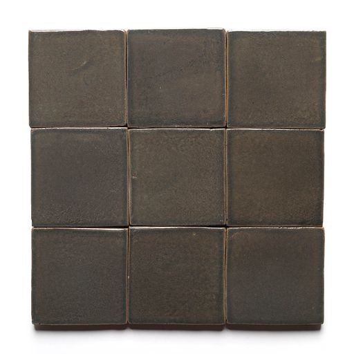 Nine Cacao 4x4 tiles by Zia Tile are neatly arranged in a 3x3 grid on a white background. Each ceramic tile features slightly uneven edges, highlighting their handcrafted appeal.