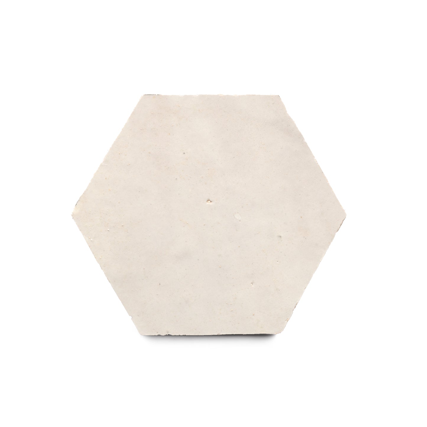 A single Casablanca Hex tile in light beige, featuring a slightly rough texture, displayed on a white background.