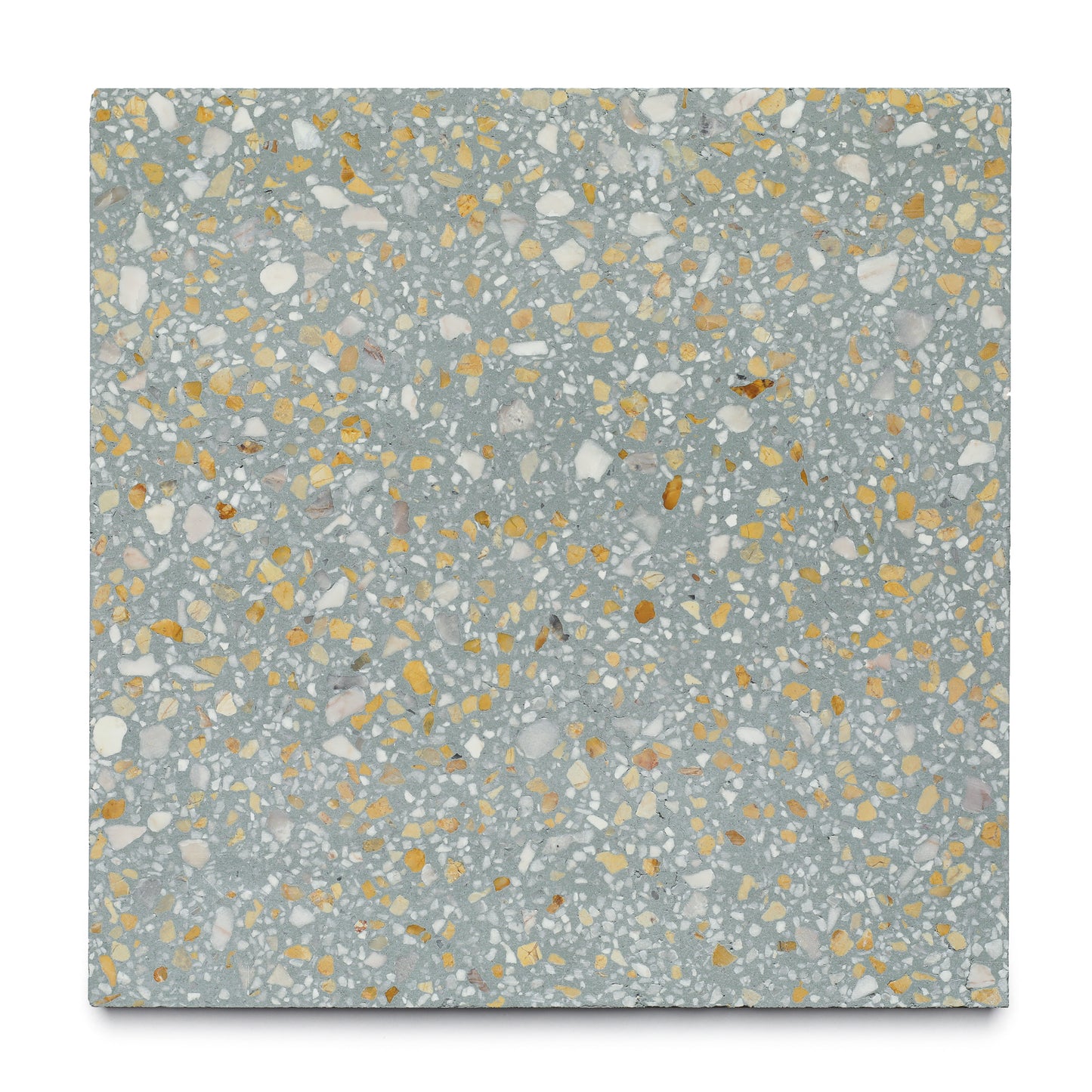 The Deepwell 12x12 by Zia Tile is a square terrazzo cement tile featuring a light gray base with irregular white, beige, and mustard yellow chips—creating a speckled look perfect for kitchen backsplashes or stylish cement floors.