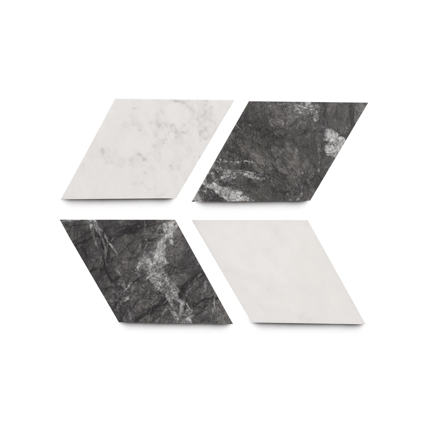 Four parallelogram-shaped Diamante in Carrara + Grigio Carnico tiles by Zia Tile—two white marble-textured and two dark gray stone-textured—are arranged in a staggered pattern, highlighting their modern elegance.