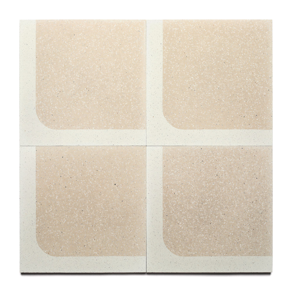 Four Draper Dune 12x12 tiles by Zia Tile, featuring square beige terrazzo with speckled surfaces and white borders on two edges, create a geometric, symmetrical grid—perfect for kitchen backsplashes or cement floors.