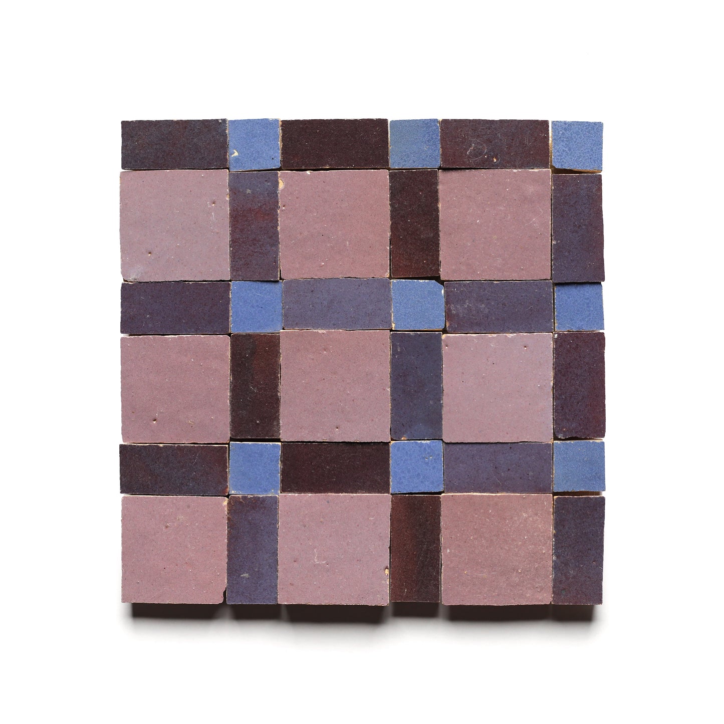 Gambit 8 by Zia Tile features small square zellige tiles in dusty pink, dark brown, and blue, arranged in a checkerboard pattern—perfect for a unique kitchen backsplash on a white background.