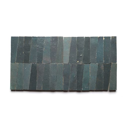 Rectangular layout of Graphite Grey Trapezoid matte tiles, arranged in two horizontal rows with irregular shapes, creating a geometric pattern on a white background.