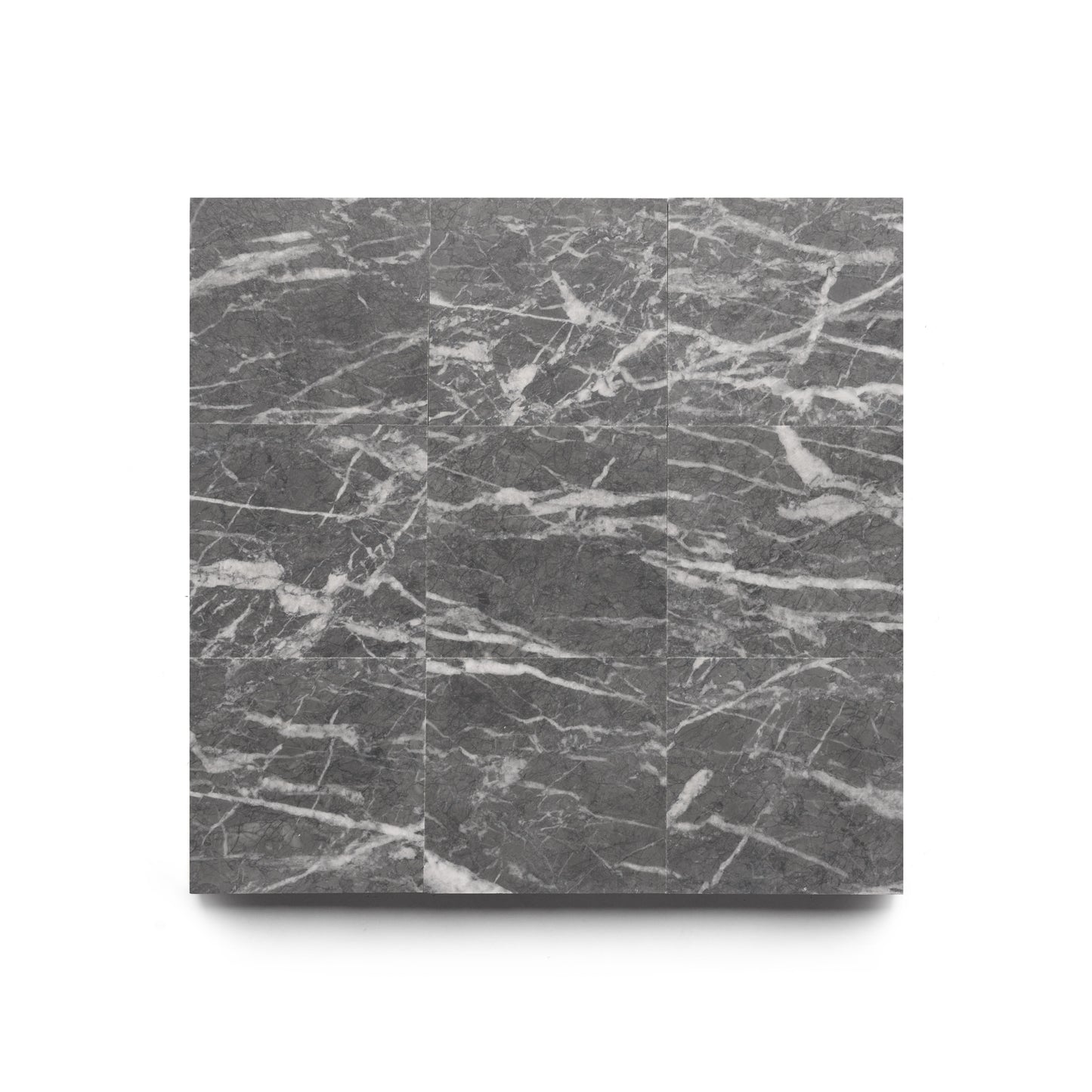 The Grigio Carnico 6x6 by Zia Tile is a square slab of dark gray marble with white veining, divided into three vertical sections with subtle seams, set against a white background.
