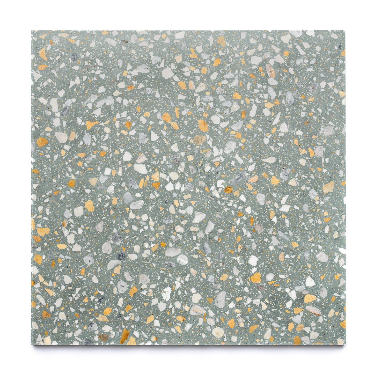 The Idyllwild 24x24 by Zia Tile is a square terrazzo ceramic tile with a light gray base and scattered white, yellow, and orange stone chips in various shapes and sizes, ideal for stylish interiors. Set against a plain white background.