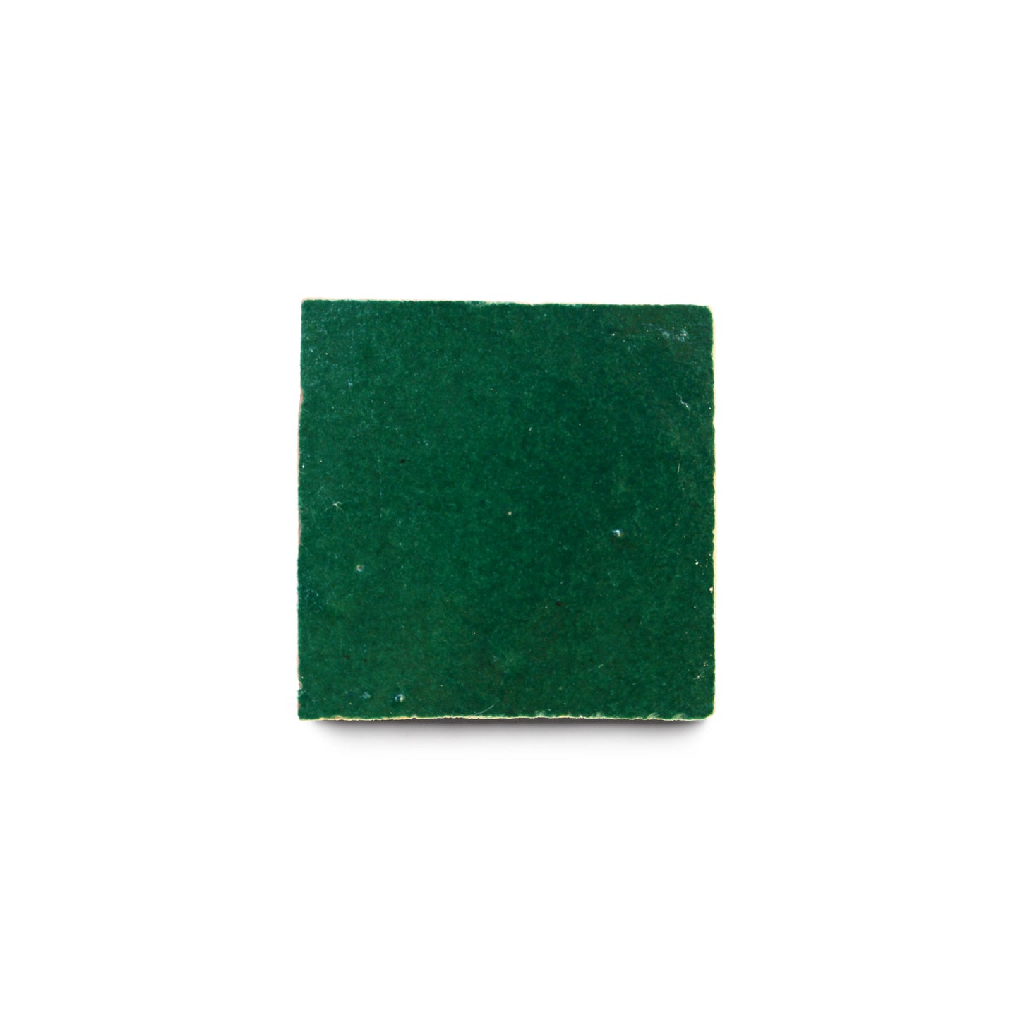 The Jade 2x2, a green square felt pad inspired by handcrafted tiles, is shown from above and centered on a white background.