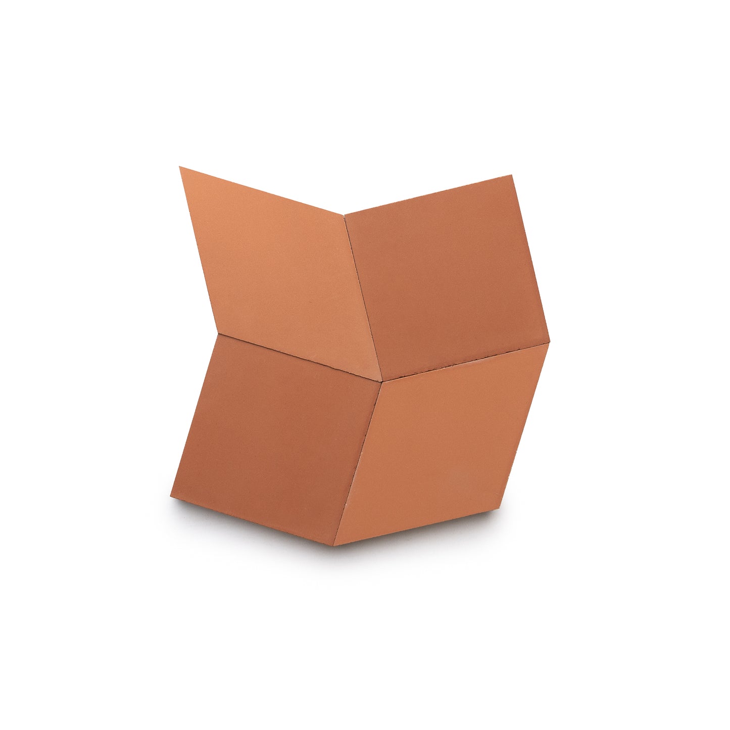 A geometric sculpture featuring two brown, three-dimensional parallelograms joined at an angle, inspired by Zia Tile’s Madrid Terra Cotta + Rust design, forms a zigzag shape against a plain white background.