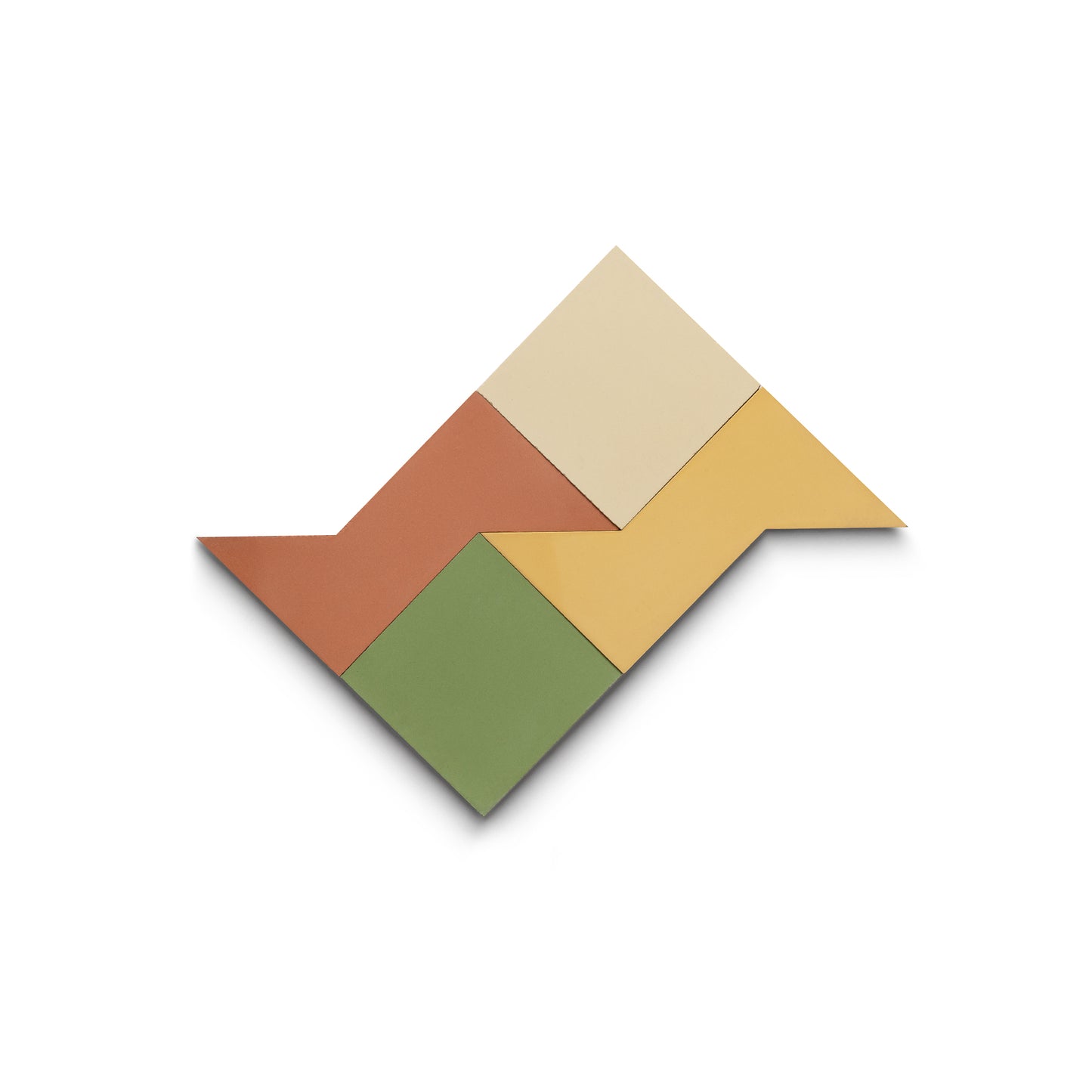 The Manolo Set Four by Zia Tile features four colored geometric cement tiles—green, brown, yellow, and cream—arranged in a zigzag, arrow-inspired pattern on a white background.