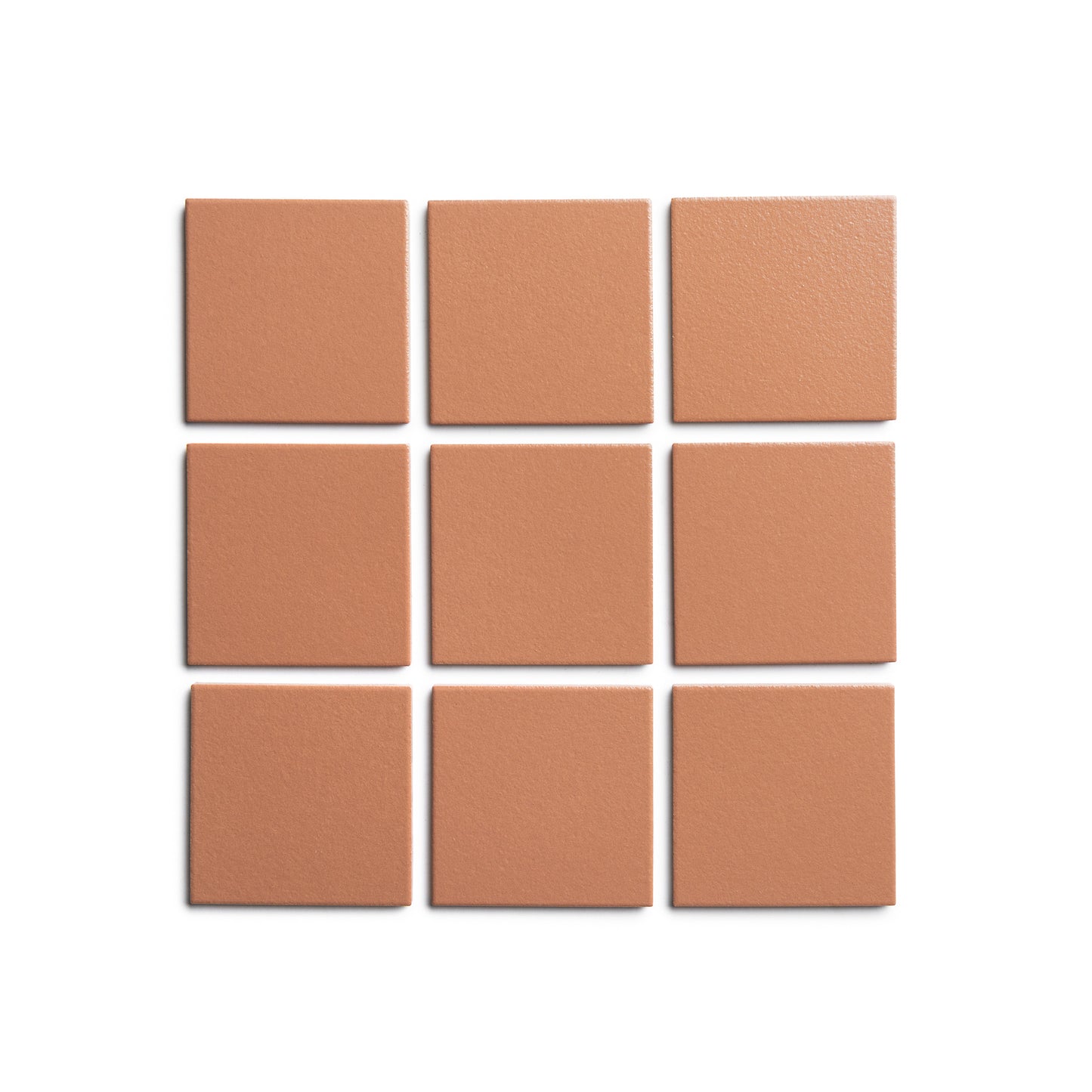 Nine Pecan 4x4 tan tiles from Zia Tile are arranged in a 3x3 grid on a white background.