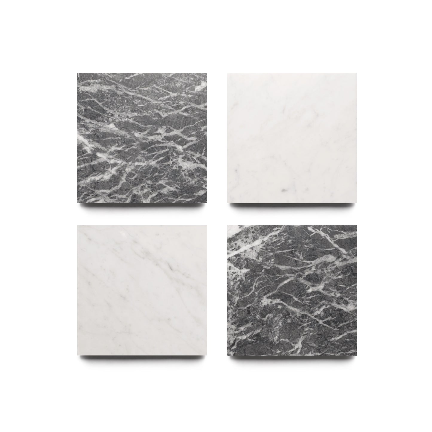Four square marble tiles arranged in a grid: top left and bottom right in Grigio Carnico, others in Carrara—highlighting the timeless elegance of Piazza marble tiles by Zia Tile.