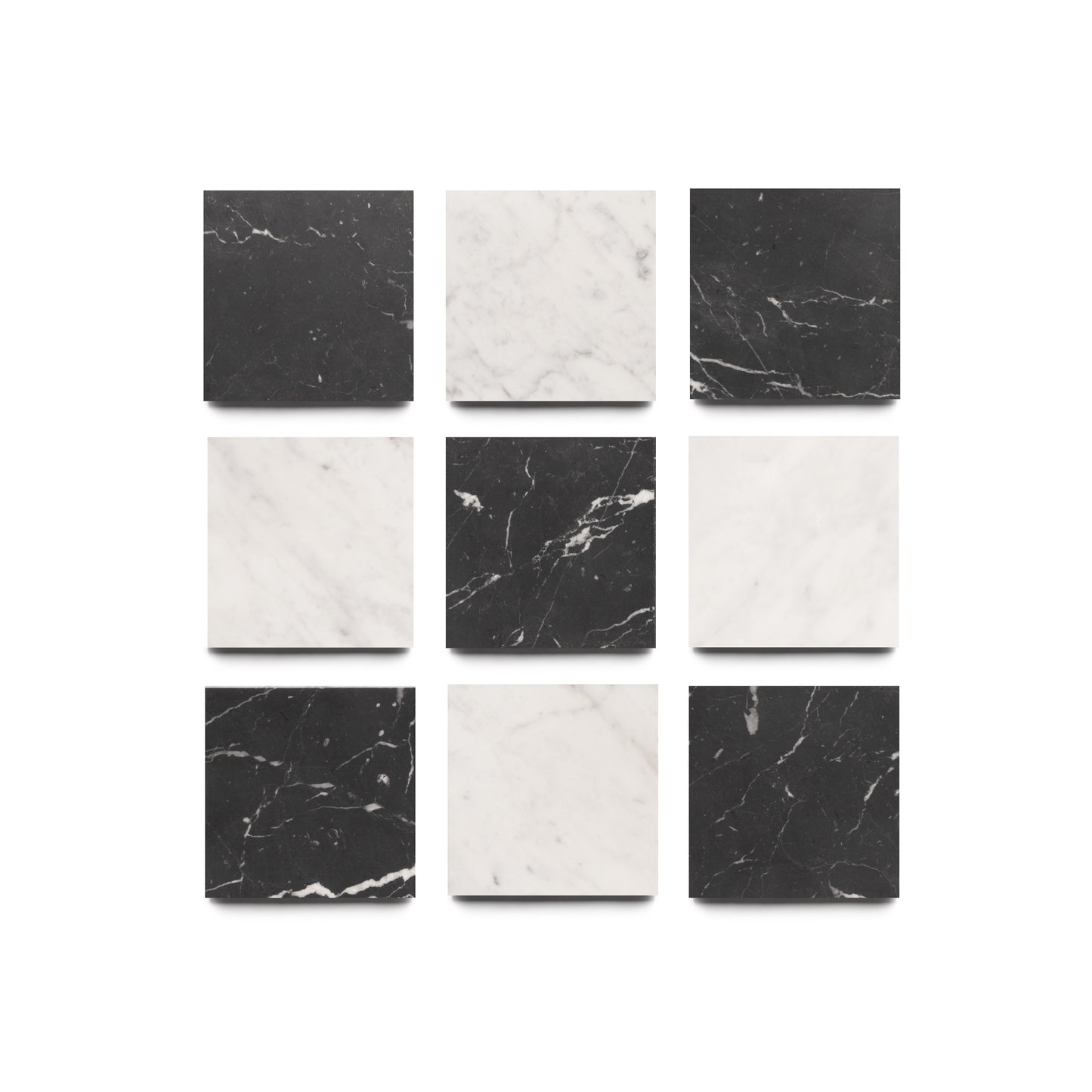 Nine Piazzetta in Carrara + Nero Marquina tiles by Zia Tile, arranged in a 3x3 grid, alternate black and white marble with natural veining, creating a classic handmade look on a white background.