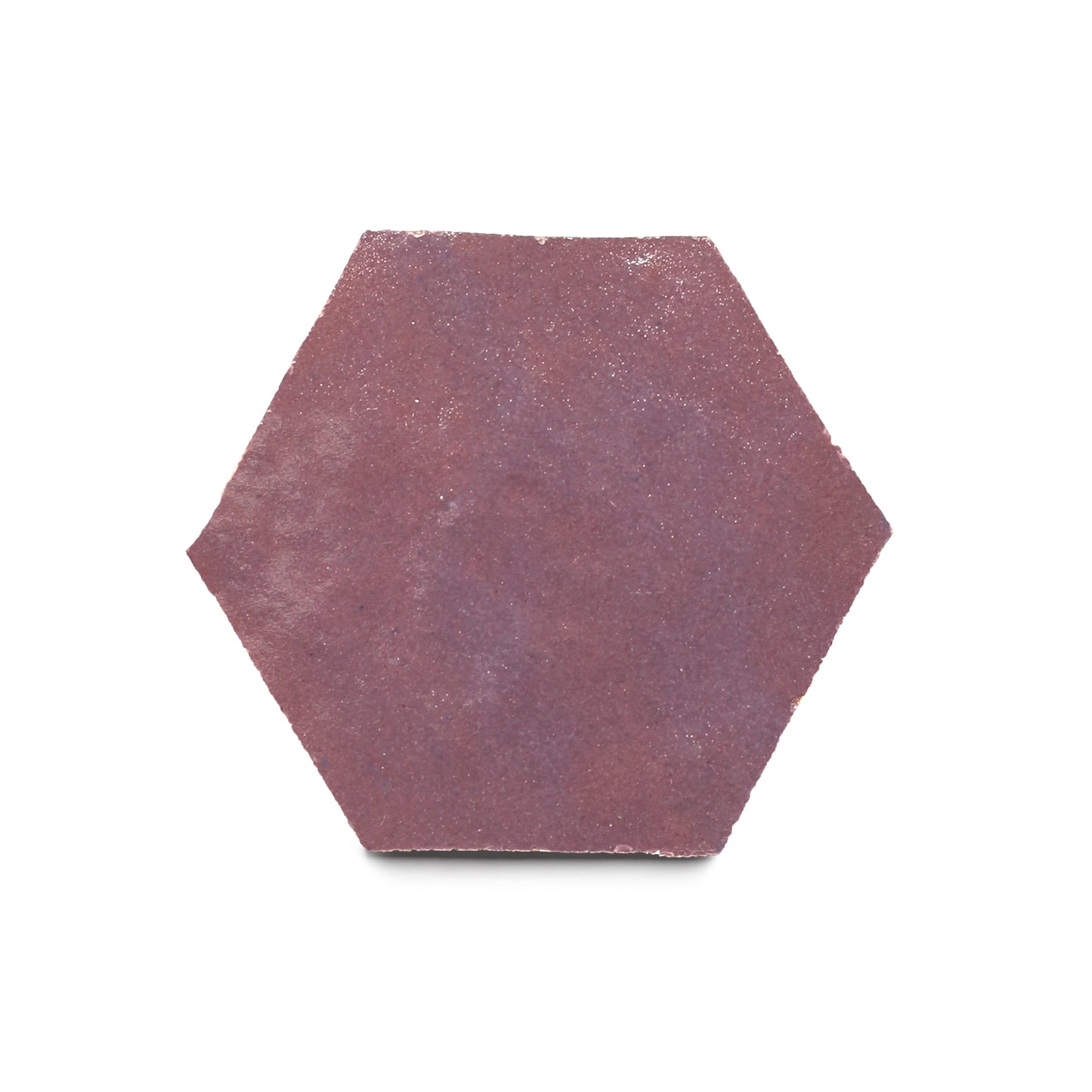 The Plum Hex tile features a rough, matte surface in muted reddish-purple, ideal for kitchen backsplashes, shown here against a white background.