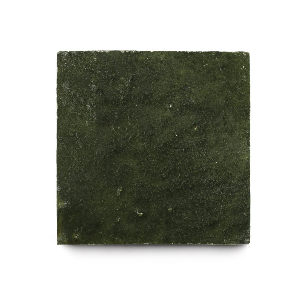 A square, dark green Racing Green 4x4 tile with a matte, lightly textured surface is shown against a white background, highlighting its artisanal appeal.
