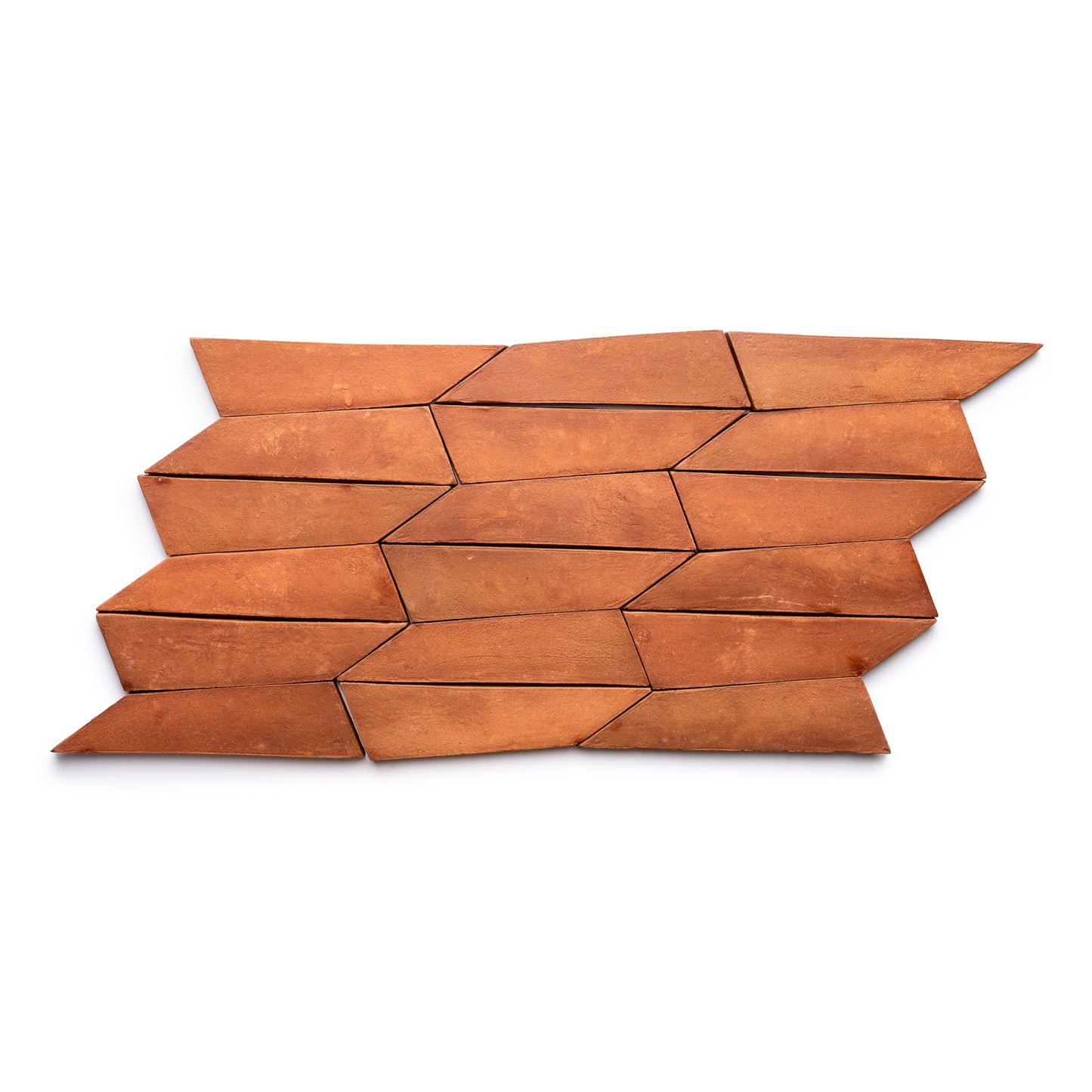 The Tornillo + Red Clay tile sample by Zia Tile features reddish-brown, irregular quadrilaterals in a staggered, interlocking pattern set against a white background.