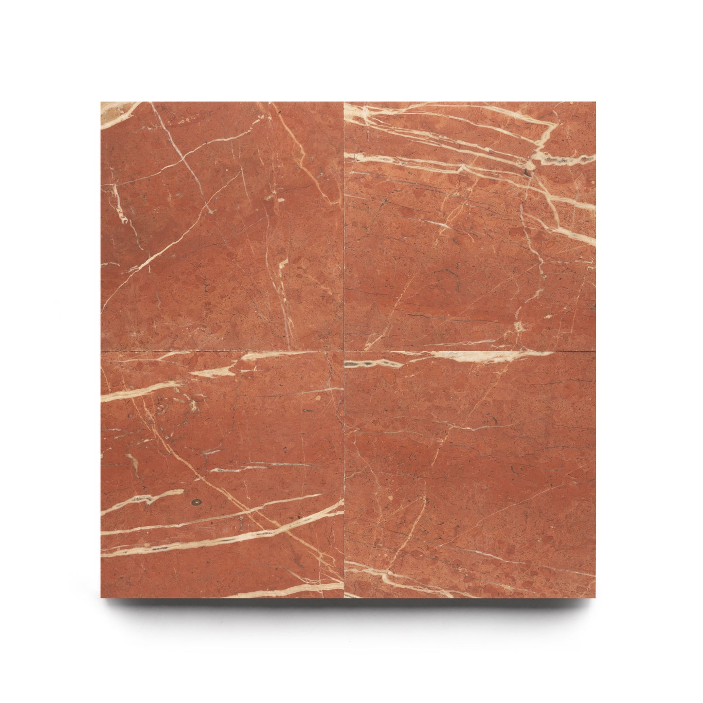 Four Rosso Alicante 12x12 tiles by Zia Tile, featuring red marble with white and beige veining, are arranged in a square. The smooth, polished finish highlights natural patterns on each tile. Background is white.
