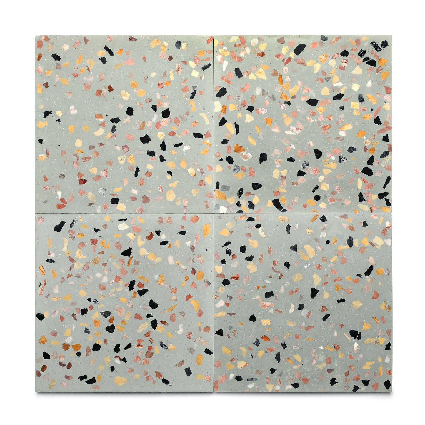 The Savoye 12x12 by Zia Tile features terrazzo cement tiles with a light gray base and colorful chips in yellow, black, pink, and orange, adding a vibrant, mosaic-like pattern and bold style to any room.