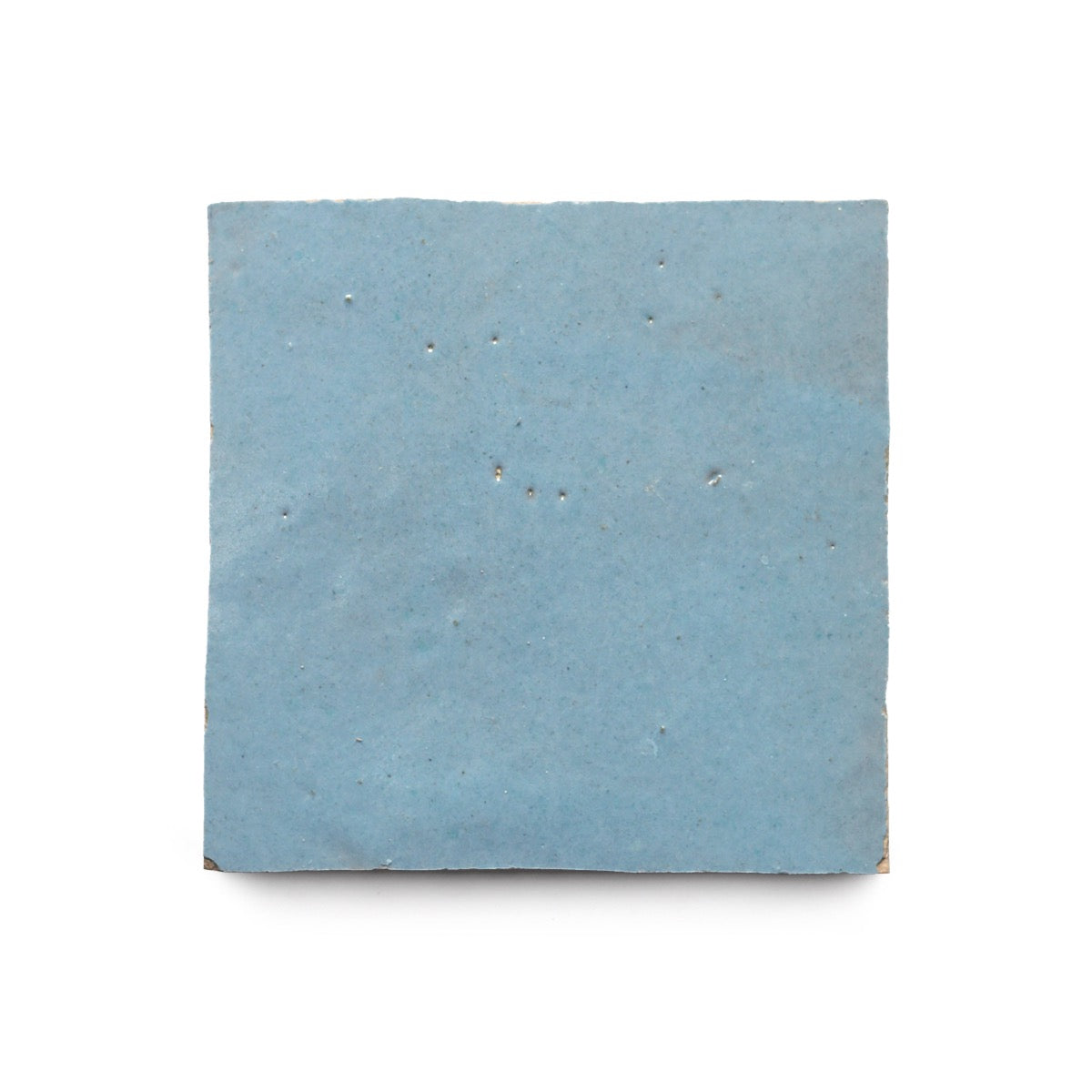 The Superior Blue 4x4 is a single matte, light blue zellige tile with subtle texture, ideal for a Moroccan-style kitchen backsplash, shown against a white background.