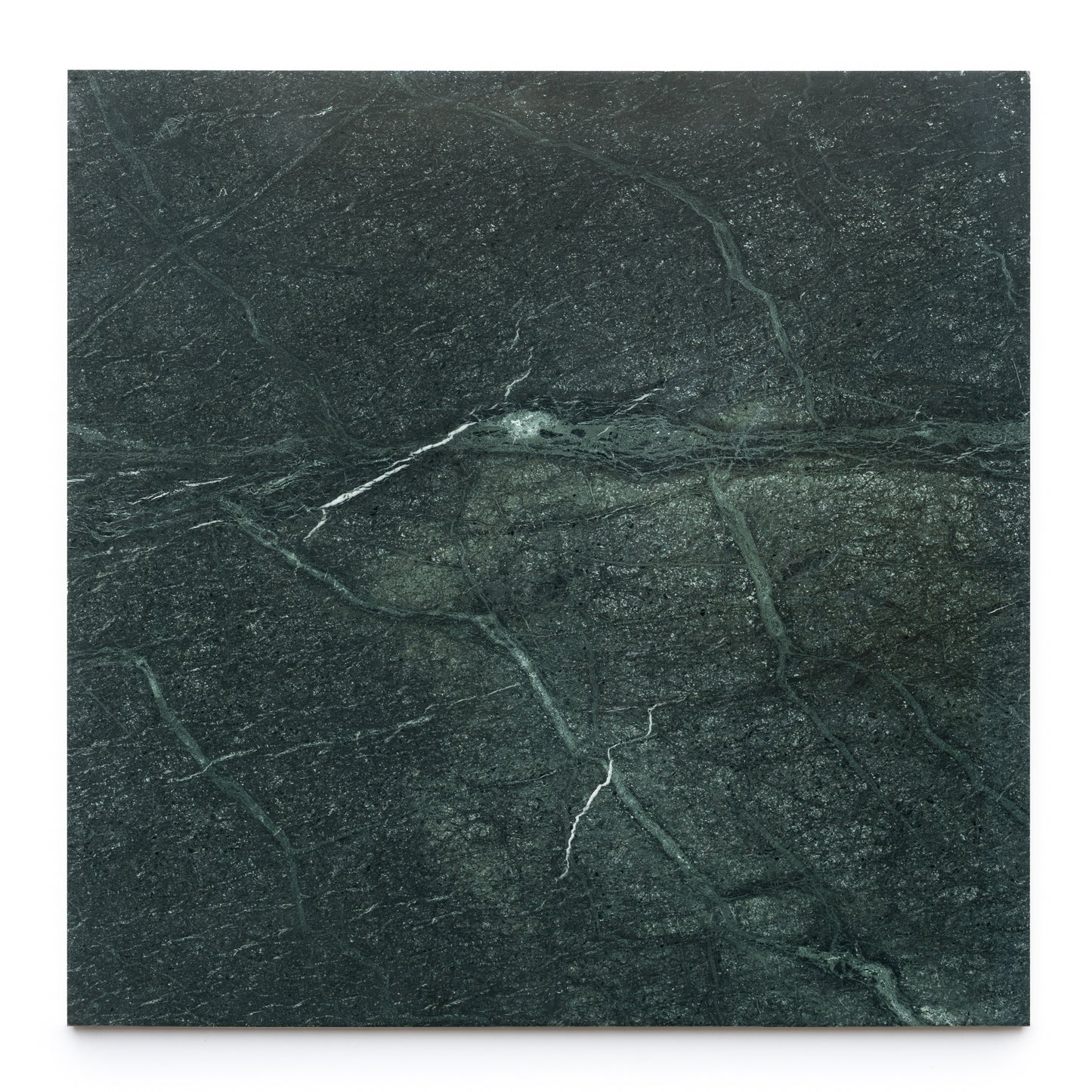 The Verde Alpi 24x24 by Zia Tile is a rectangular dark green marble tile with subtle white veins, displayed vertically against a white background to highlight its signature elegance.