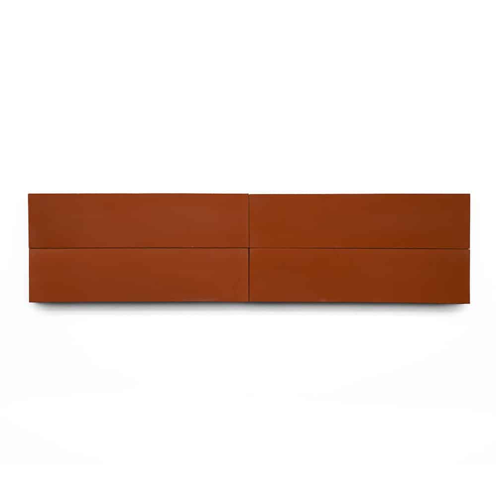 The Atomic 2x8 is a minimalist, rectangular, wall-mounted cabinet featuring four flat rust-colored drawers arranged in two rows, shown against a white background evoking a clean kitchen backsplash.