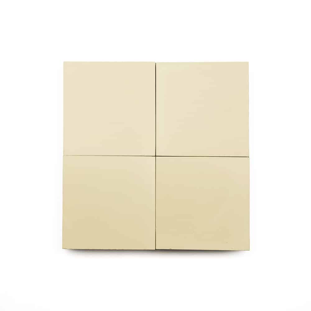 A minimalist image of Canvas 4x4 beige cement tiles arranged in a two-by-two grid on a white background, perfect for a kitchen backsplash.