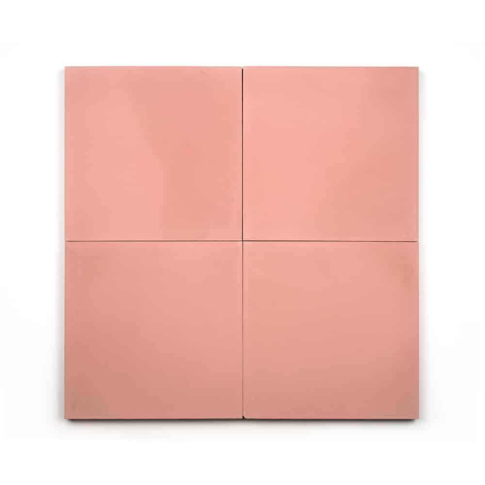 Four square, matte Delta Moon 8x8 light pink cement tiles arranged in a two-by-two grid on a white background.