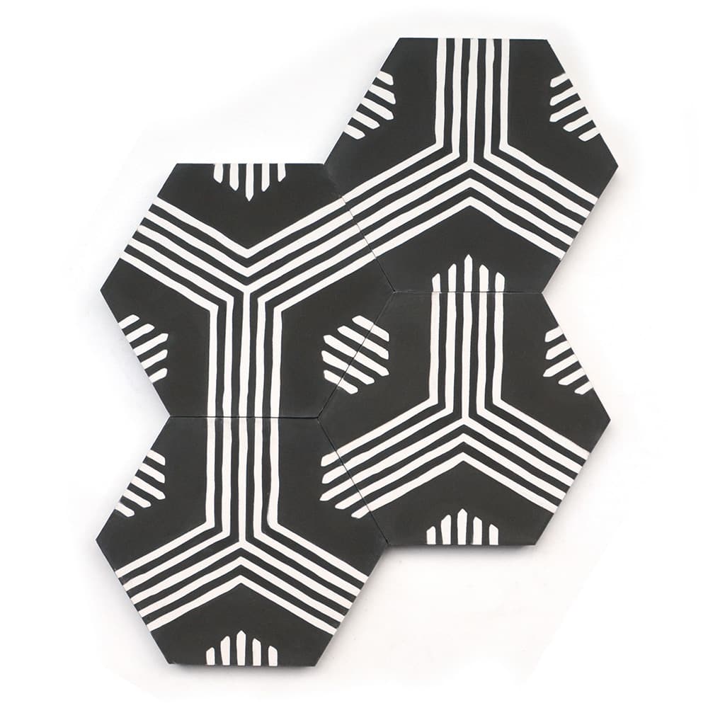 Three Echo Charcoal Hex tiles from vendor-unknown, featuring bold white geometric lines on black hexagons, are arranged together to create a striking and modern symmetrical design.