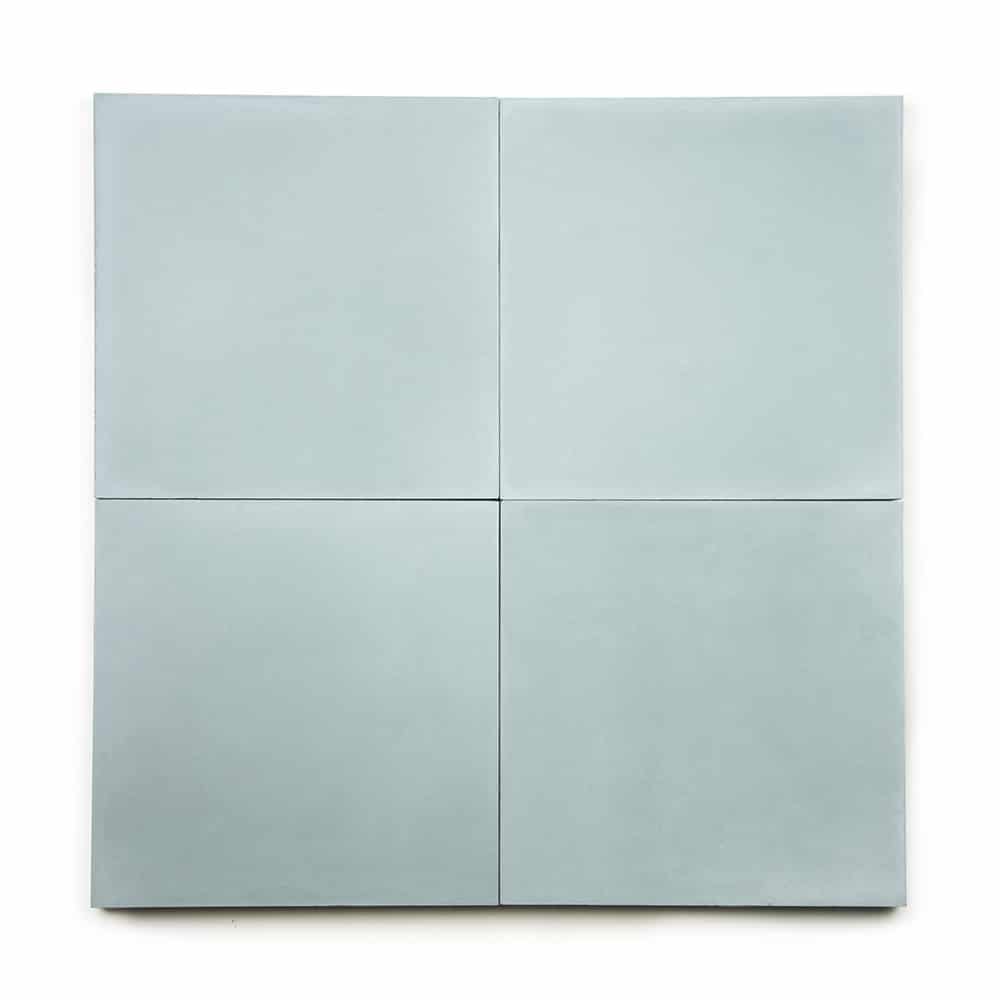 Four Hailstone 8x8 pale blue cement tiles are arranged in a 2x2 grid, creating a larger square with clean edges and smooth surfaces.