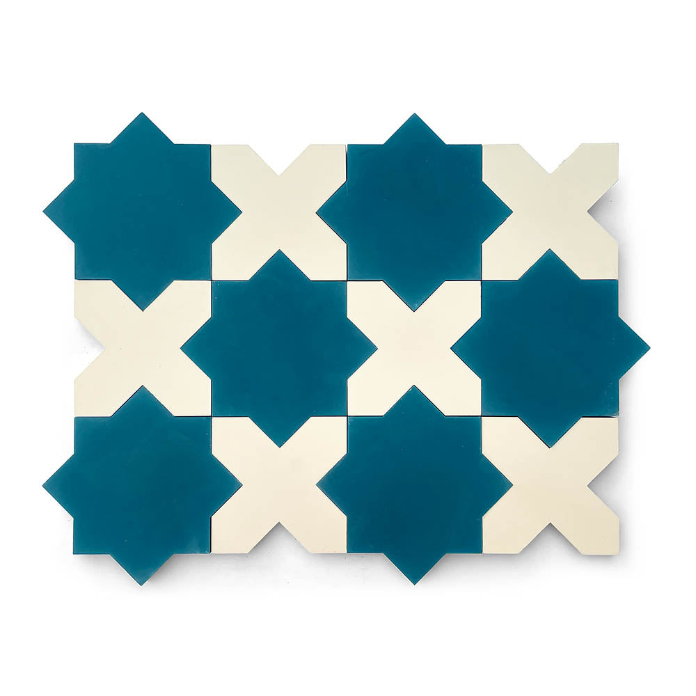 Nine tiles in a grid, with teal eight-pointed stars and white X-shapes, capture the elegance of Moorish floor tiles—perfect for kitchen backsplashes with Stars & Cross Midnight cement tiles.