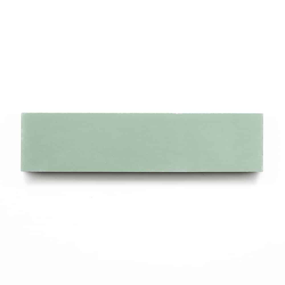 A Mint 2x8 rectangular subway tile in light green is centered on a plain white background.