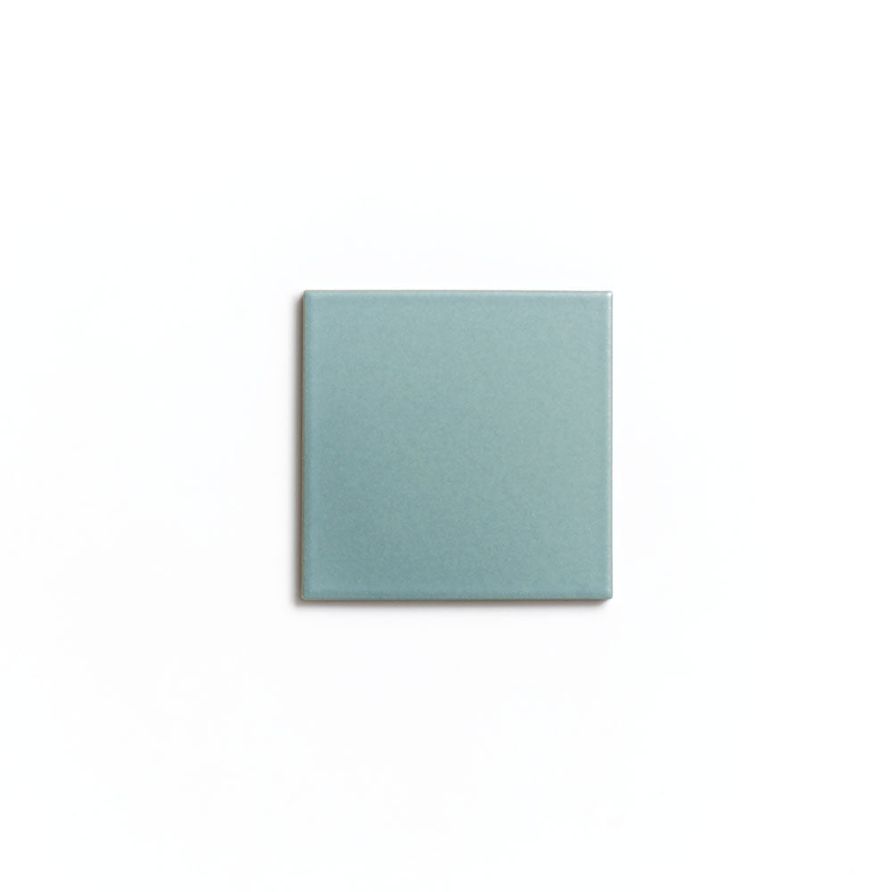 The Moonlight 4x4 ceramic tile by Zia Tile, featuring a matte teal finish, is centered on a plain white background.
