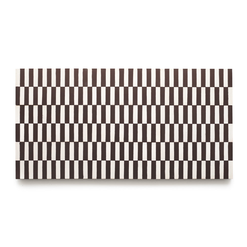 The Rialto Black 4x8 showcases a rectangular design with repeating vertical black and white stripes in offset rows, creating a geometric, rhythmic pattern perfect for adding a bold accent to kitchen backsplashes.