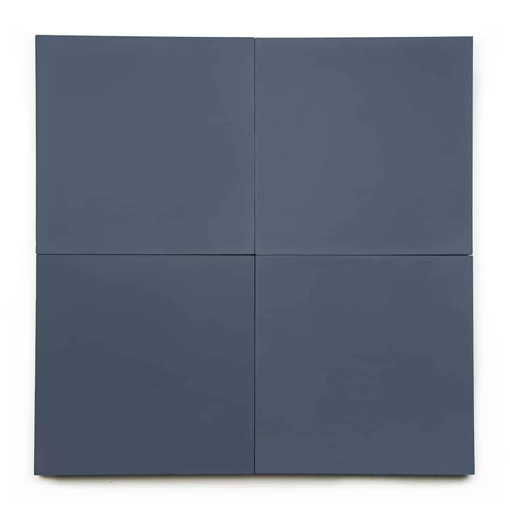 Four Slate 8x8 dark gray square panels are arranged in a 2x2 grid on a white background, highlighting minimalist geometric style and evoking the clean texture of cement tile.
