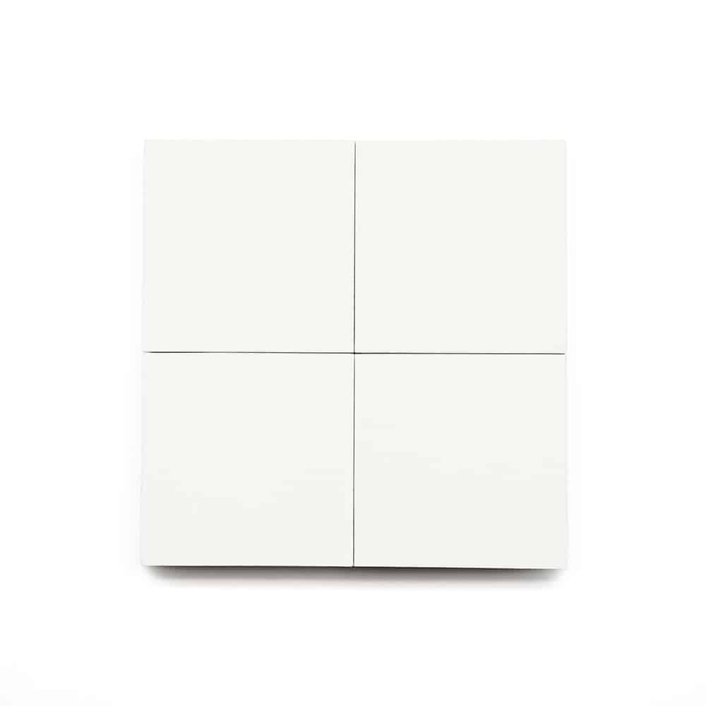 The White 4x4 features a white square divided evenly into four smaller squares, resembling a classic cement tile—ideal for bathroom floors or kitchen backsplashes, set against a plain white background.