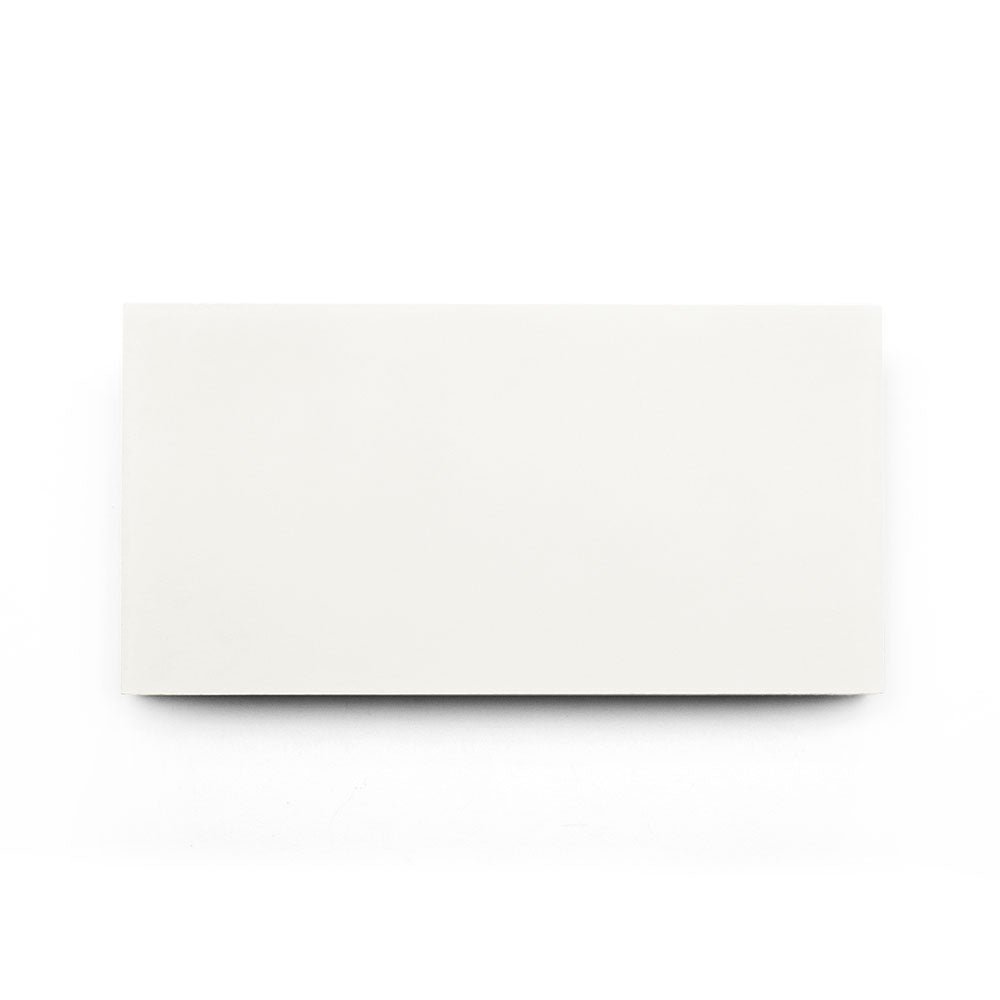 The White 4x8 tile features a plain, rectangular design against a white background, making it an ideal choice for a modern kitchen backsplash.