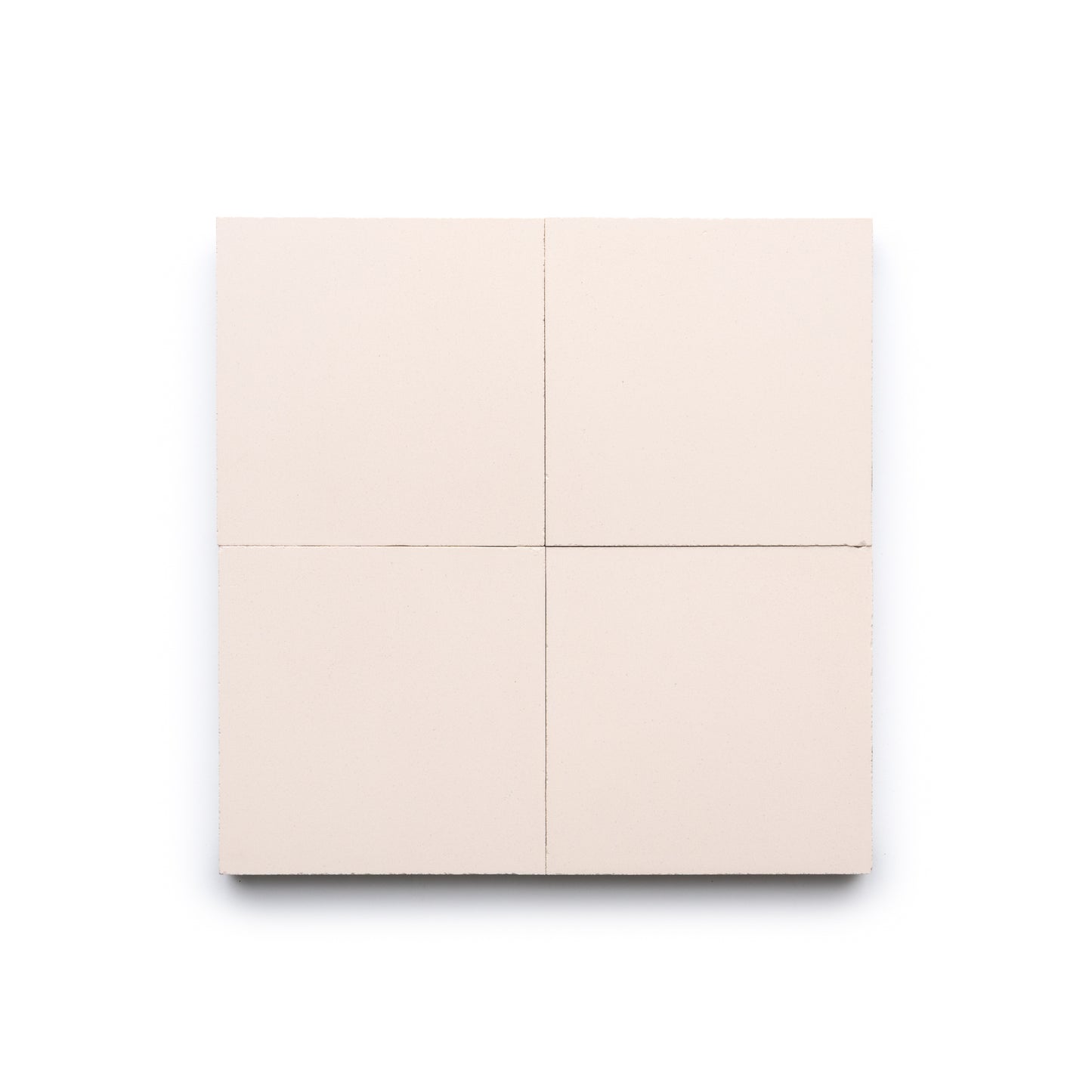 A square arrangement of four Zia Tile Ballet Slipper 4x4 light beige tiles with subtle seams, displayed on a white background.