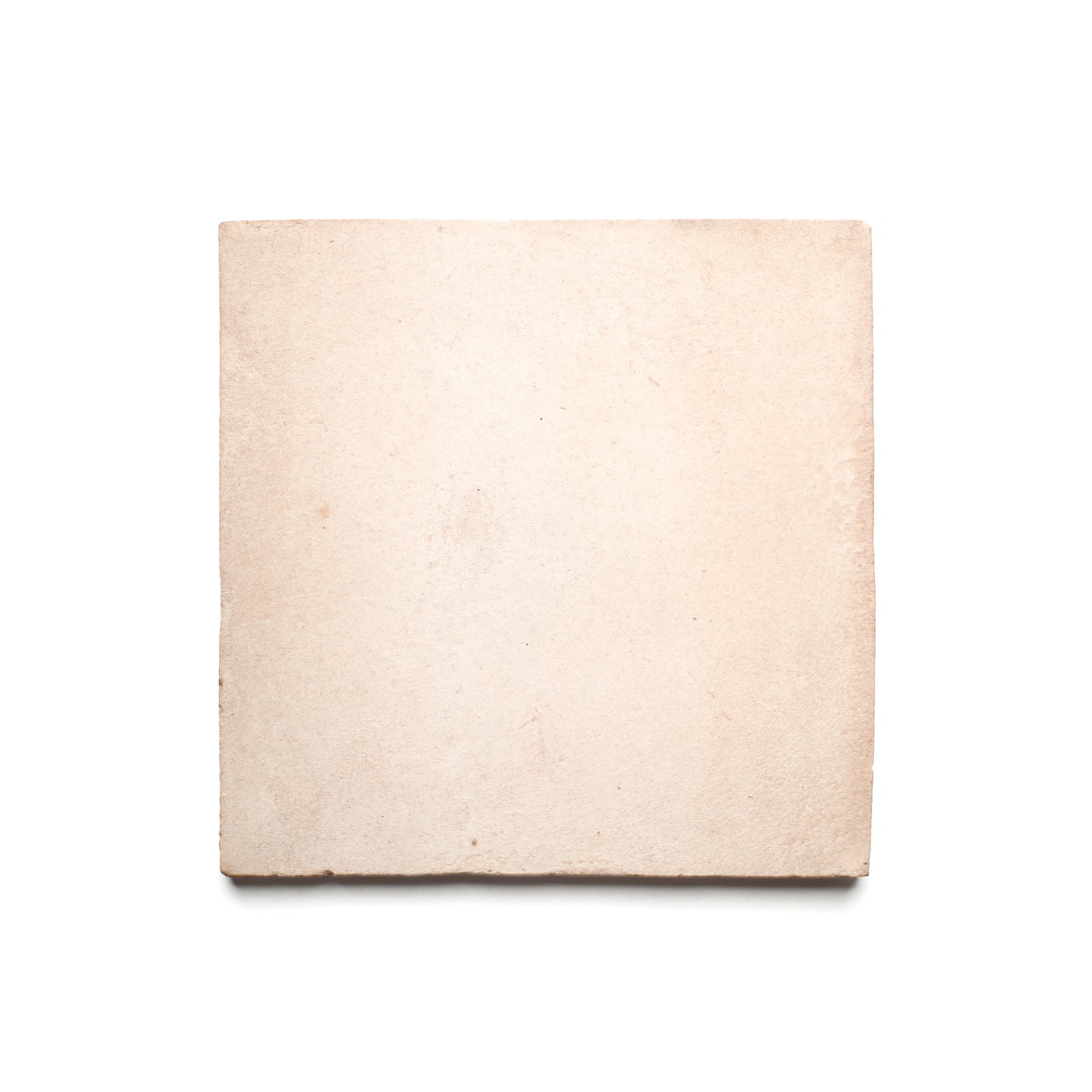 An 8x8 Square + Blanco ceramic tile by Zia Tile, light beige with a rough, handmade-style texture inspired by Cotto from San Miguel de Allende, is shown against a white background.