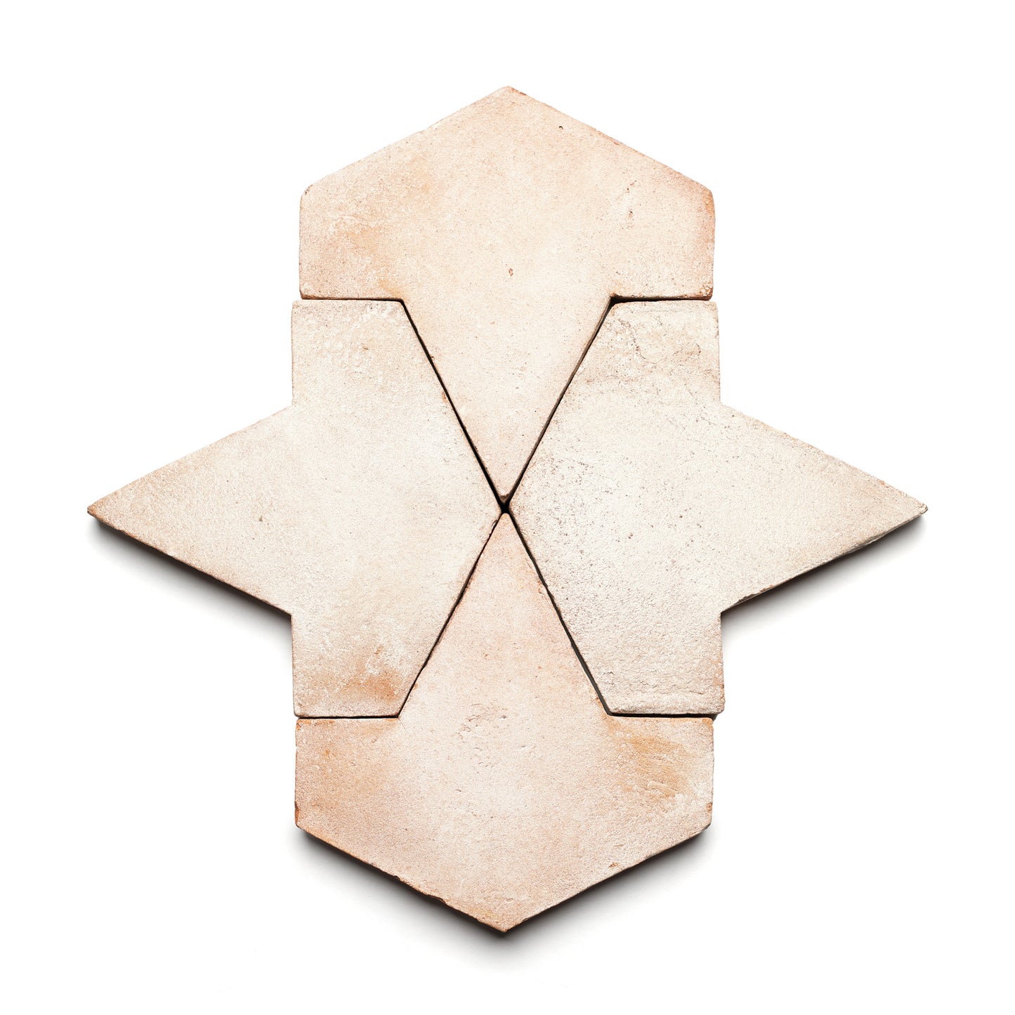 Six light brown, matte Alcazar + Blanco tiles by Zia Tile are arranged on a white background, creating a geometric, star-like pattern with crisp straight edges.
