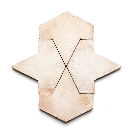 Six light brown, matte Alcazar + Blanco tiles by Zia Tile are arranged on a white background, creating a geometric, star-like pattern with crisp straight edges.