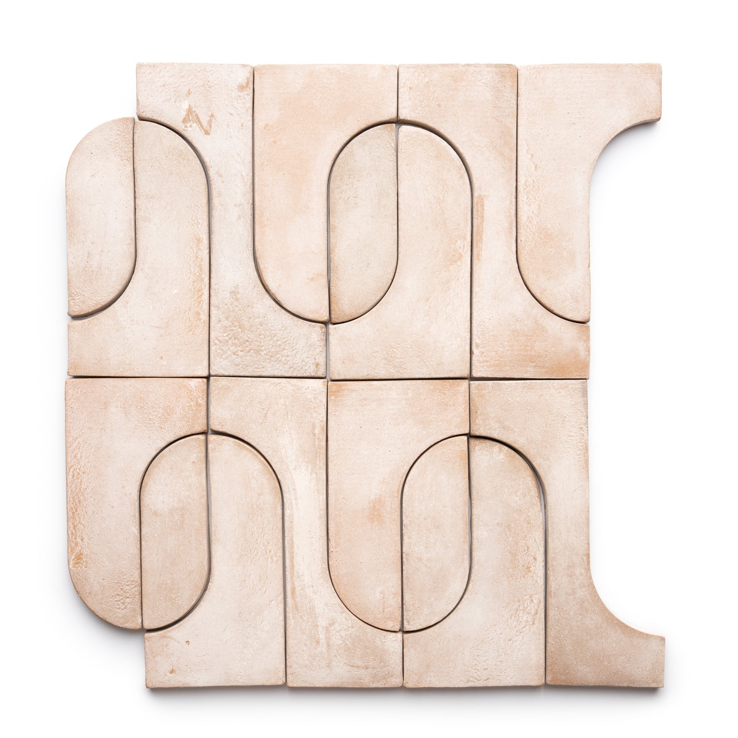 A square layout of Durango + Blanco textured ceramic tiles by Zia Tile features light beige tones and geometric, abstract curved patterns on a white background.