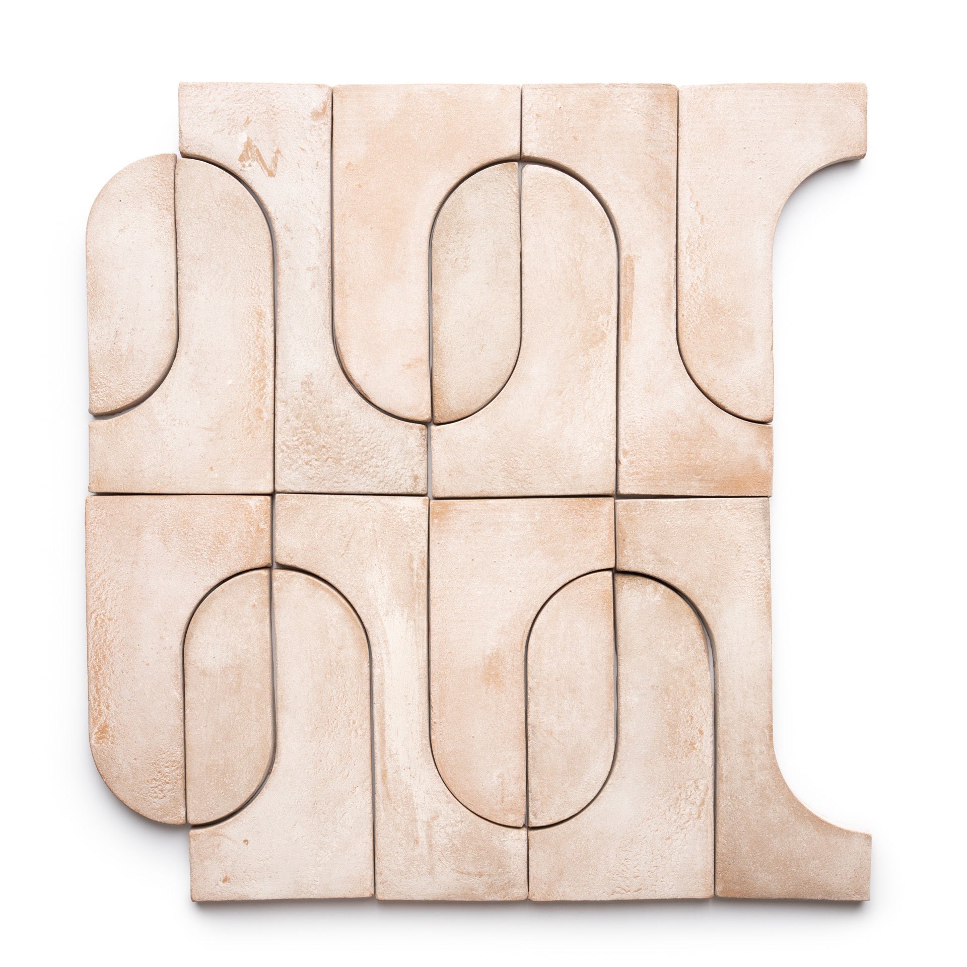 A square layout of Durango + Blanco textured ceramic tiles by Zia Tile features light beige tones and geometric, abstract curved patterns on a white background.