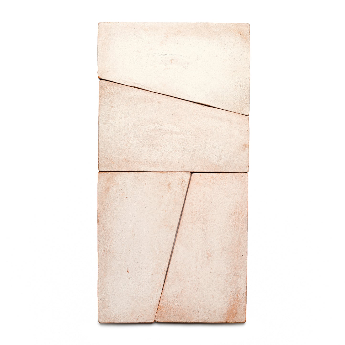 Four rectangular, pale beige Toltec + Blanco tiles by Zia Tile are stacked vertically, each with clean, slightly irregular edges and subtle diagonal lines for a geometric, modern look inspired by San Miguel de Allende.