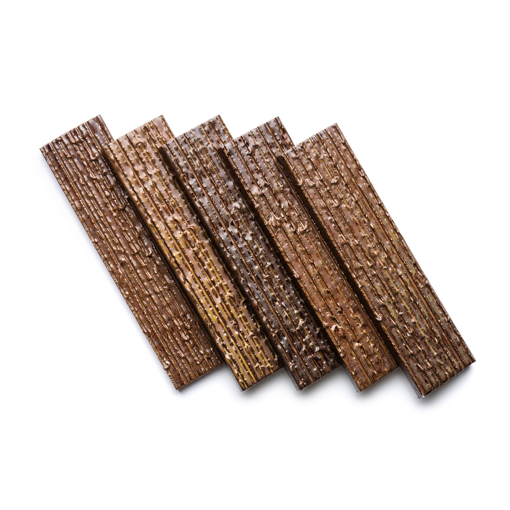 Five Buckeye + Furrowed chocolate-covered wafer biscuits from Zia Tile are arranged in a fanned-out pattern on a white background.