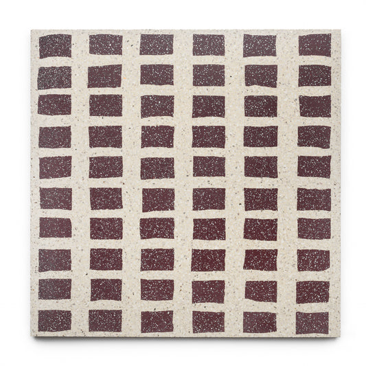 Constellation Bone + Aubergine 24x24 by Zia Tile features a grid of maroon rectangular shapes on a beige, speckled background, arranged in rows and columns for a repetitive geometric pattern.
