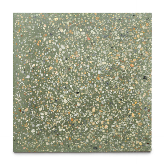 The Zia Tile Desert Oasis 24x24 is a handmade square terrazzo tile featuring a green base and scattered multicolored stone chips of various sizes, displayed on a plain white background.