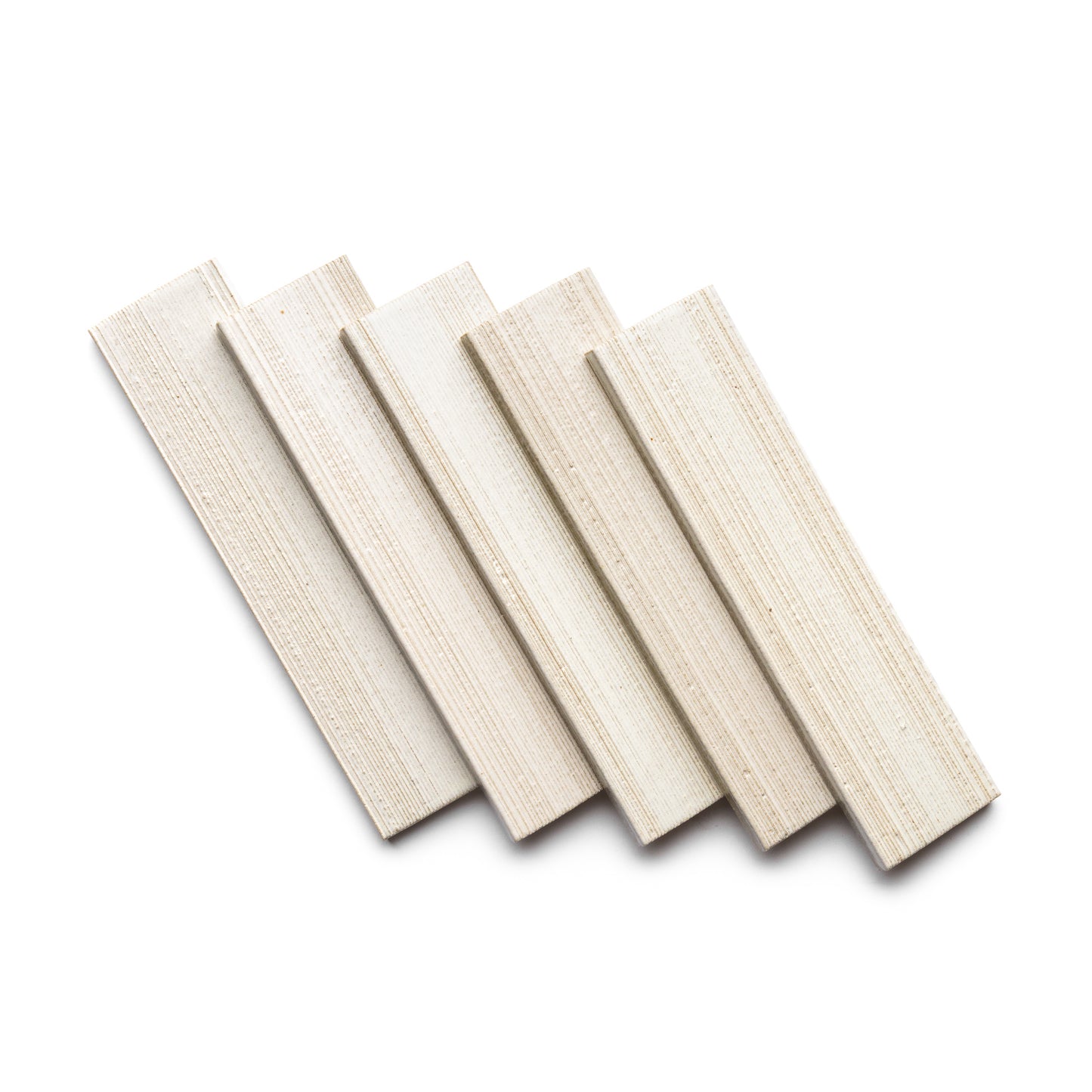 Five Feather + Etched rectangular tiles from Zia Tile, in a light wood finish, are displayed slightly overlapping in a fanned-out pattern on a white background.