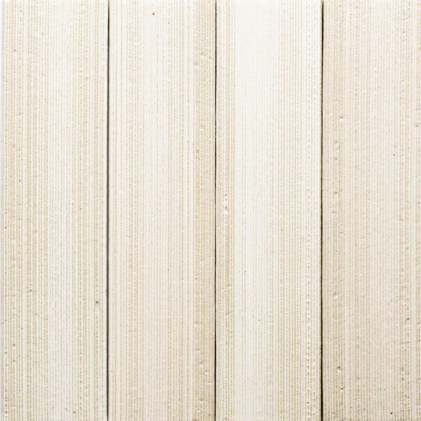 Close-up of Zia Tile's Feather + Etched: four vertical wooden planks in light beige with fine textured lines, forming a subtle striped pattern. The clean surface is evenly spaced.