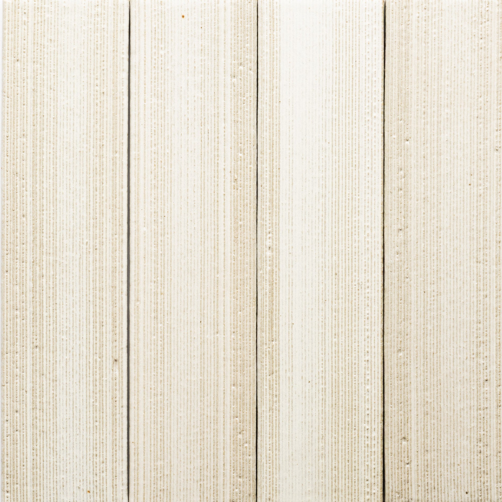 Close-up of Zia Tile's Feather + Etched: four vertical wooden planks in light beige with fine textured lines, forming a subtle striped pattern. The clean surface is evenly spaced.